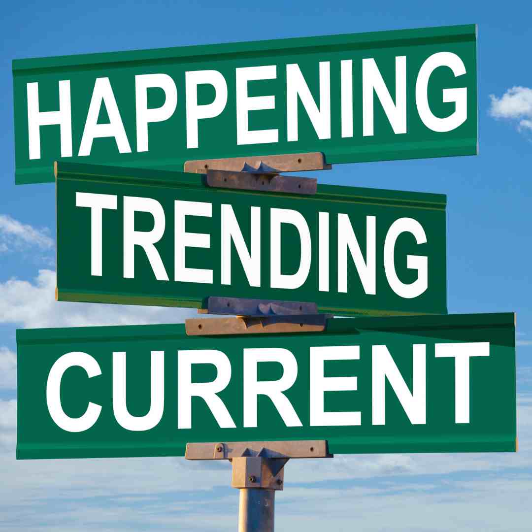 signs saying 'happening' 'trending' 'current'