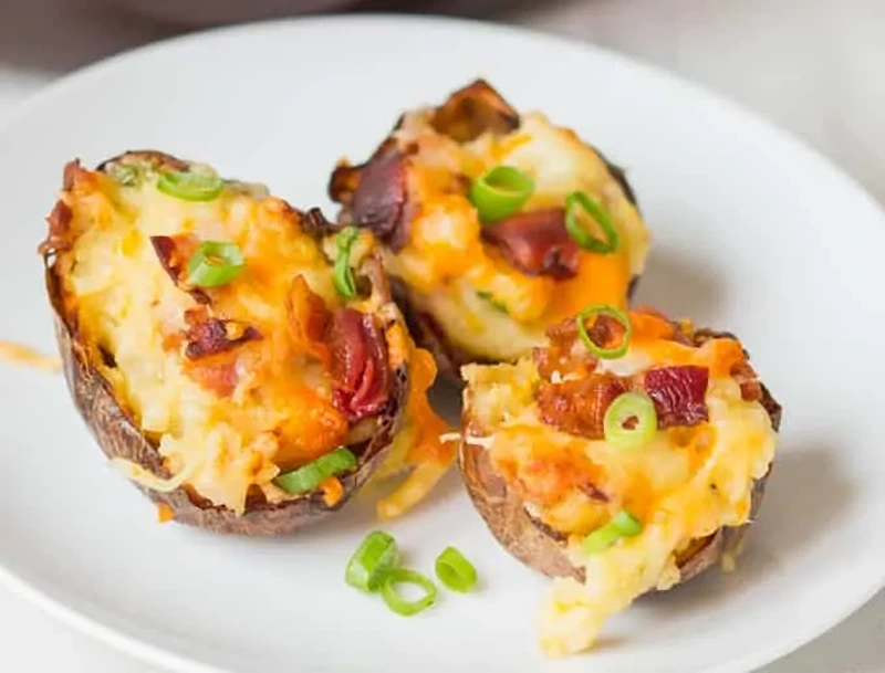 Cheesy Stuffed Potato Skins top the American BBQ menu ideas.