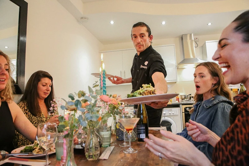 Group of women enjoying a canapes catering in London.