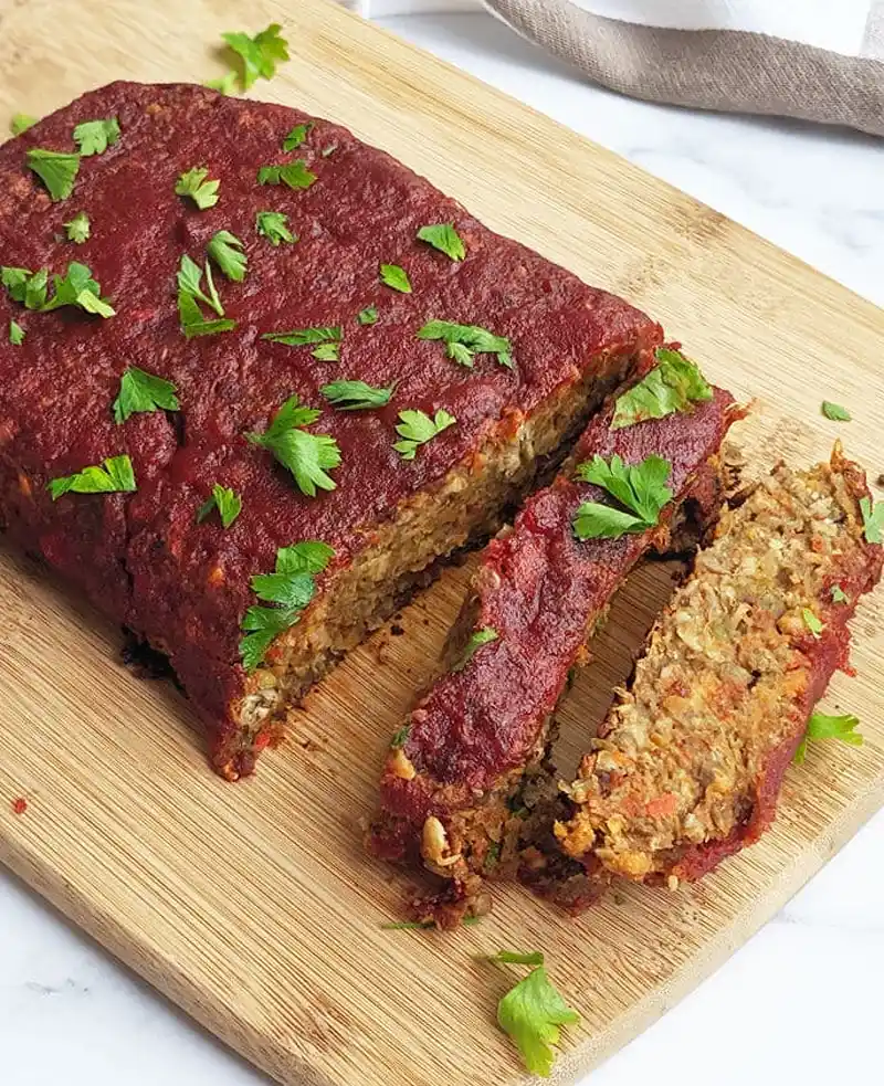 A slice of lentil and vegetable loaf, perfect for a Christmas vegetarian main course.