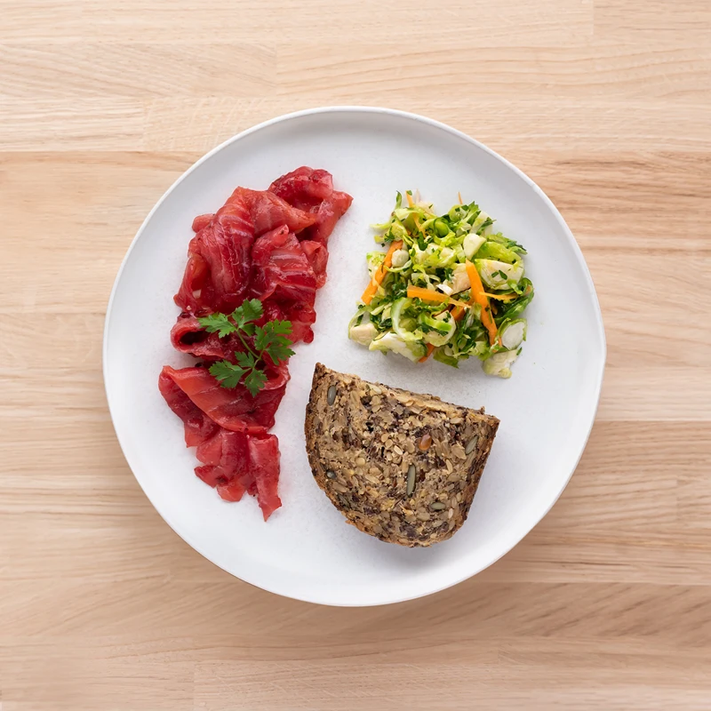 A serving of Beetroot Gravadlax on Rye for traditional Christmas starters