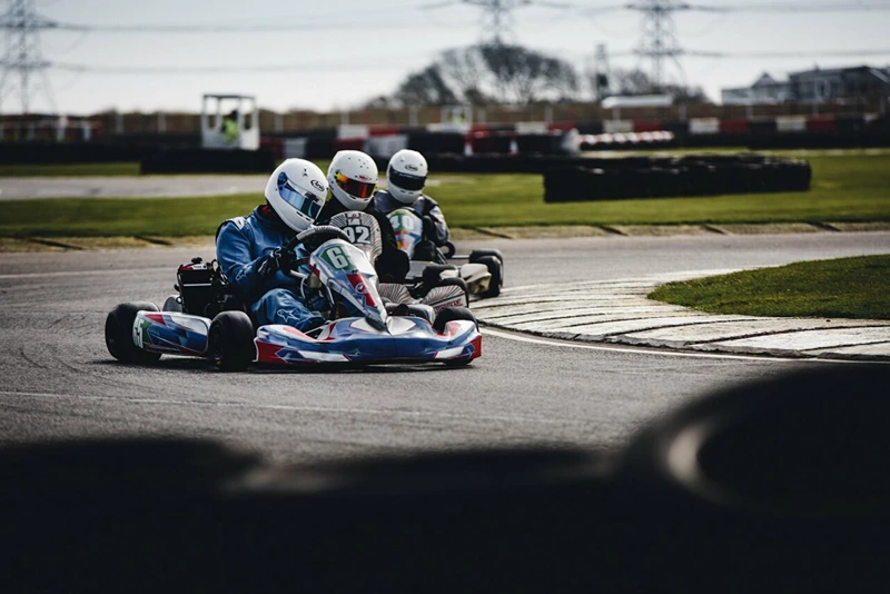 Men exploring funny stag do ideas with Go-Karting.