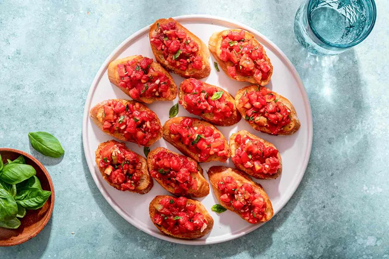 Plated tomato and basil bruschetta, perfect for vegetarian starters at Christmas.