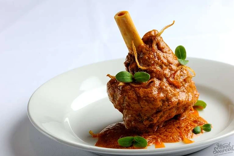 A plate of Lamb Shanks for NYE dinner ideas.