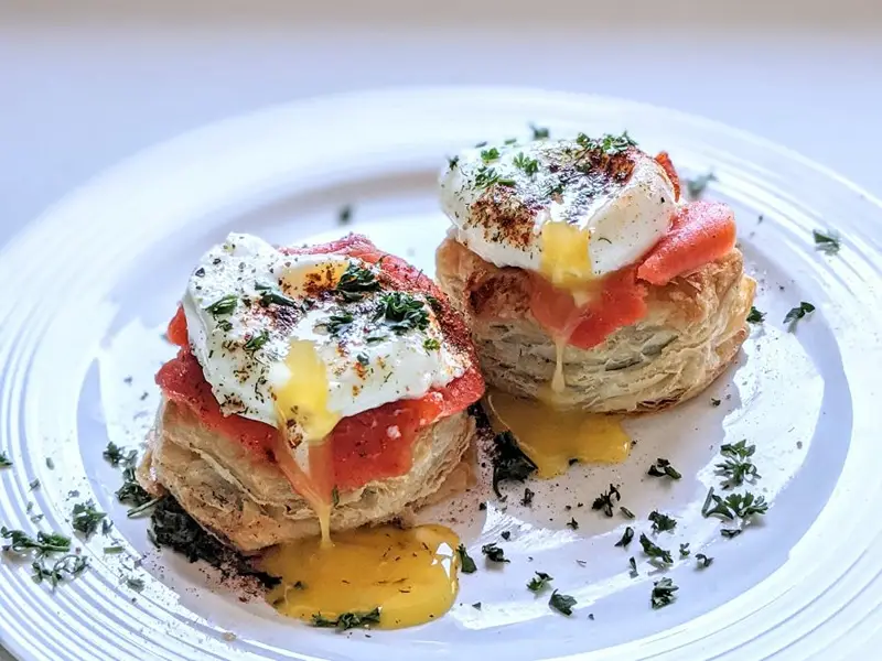 A serving of smoked salmon and chive vol au vents for New Year's Eve buffet menu ideas.