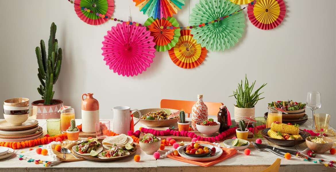 Colourful Indian dinner party ideas with traditional dishes and vibrant decorations.