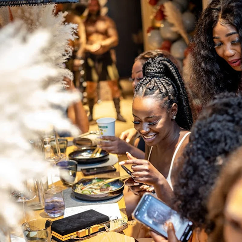 Women enjoying a hen party catering in Bath, provided by Yhangry.