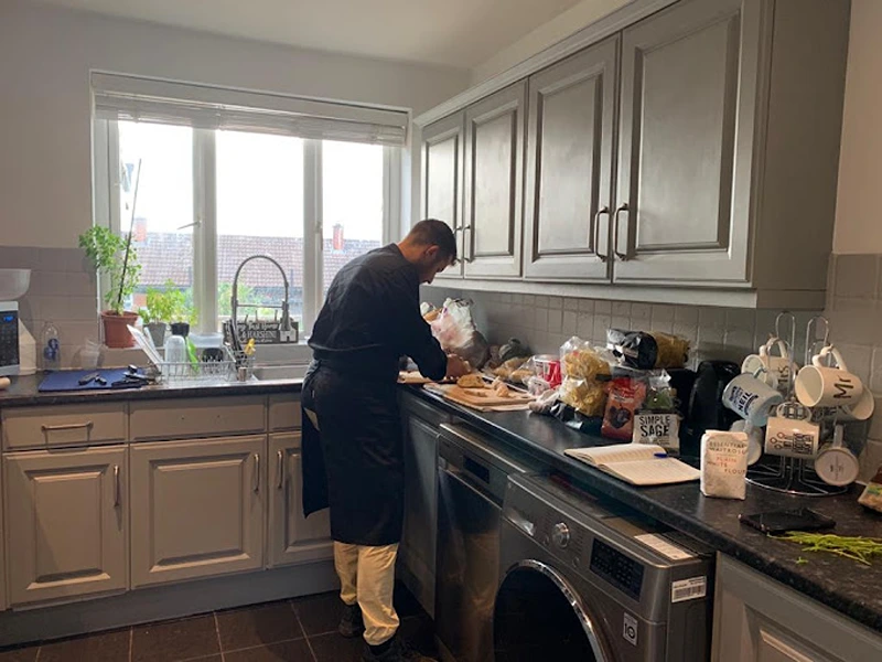 A hen party chef preparing food.