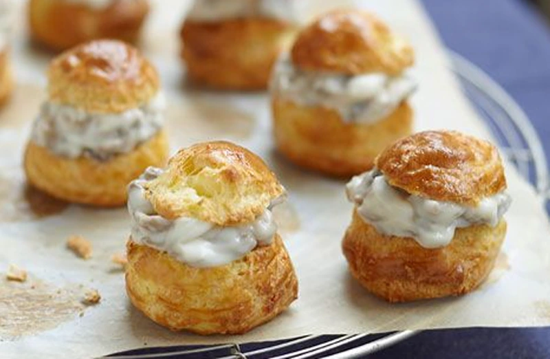 Creamy Goat’s Cheese Choux Buns for traditional New Year's Eve dinner UK.