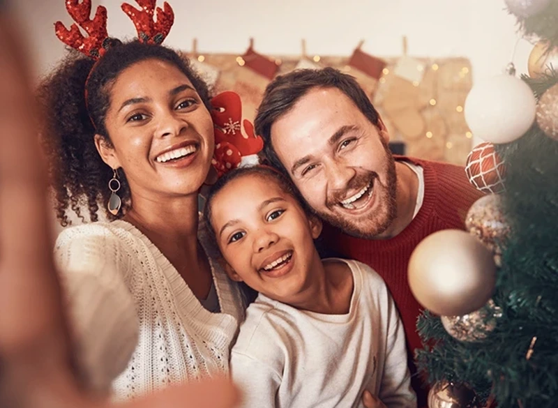 A family portrait selfie, answering what to buy my wife for Christmas.