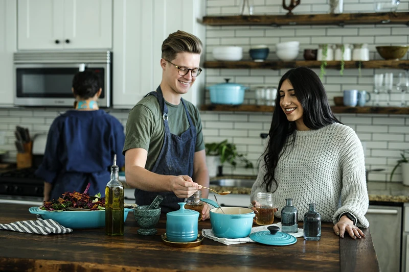 Picture of a woman in a cooking class, suggesting what to get my wife for Christmas.