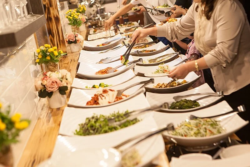 Buffet spread demonstrating how to start a small catering business.